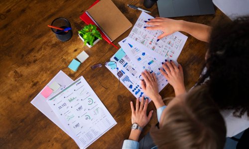 top-view-women-working-together-office
